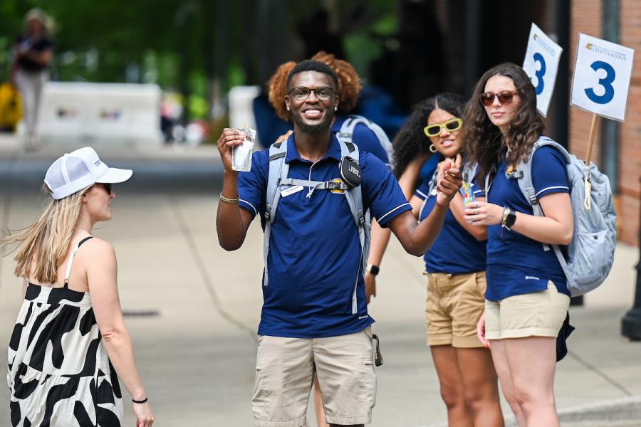 Visiting UTC UTC Orientation leaders standing getting ready for students