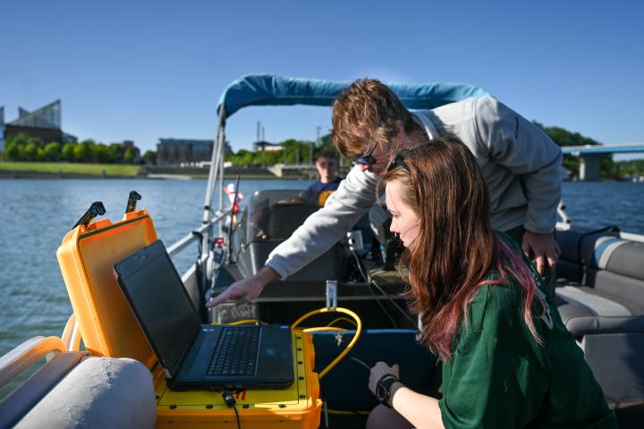 UTC Underwater archaeology students using equipment on a boat