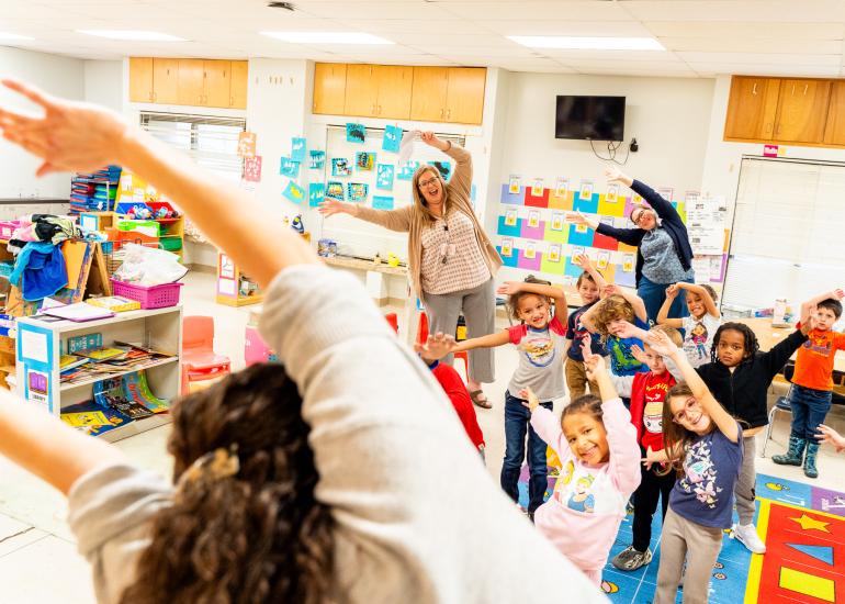ABC 2 An ABC Teaching Artist leads a happy classroom in movement