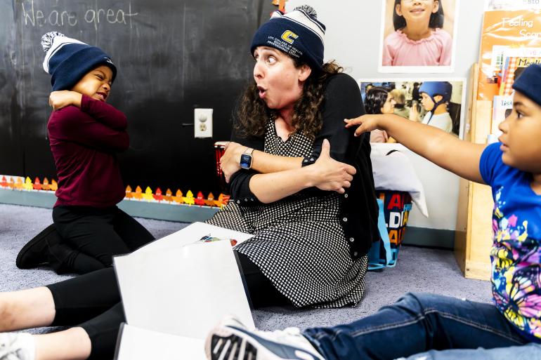 ABC UTC-WT Intro Photo An ABC Teaching Artist engages students, all wearing UTC gear