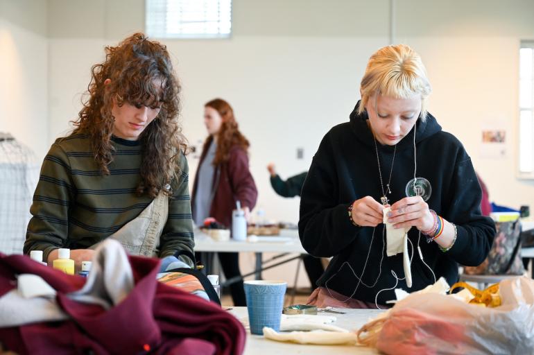 Space and Sequence Students work side-by-side manipulating materials in Foundations course, Space and Sequence